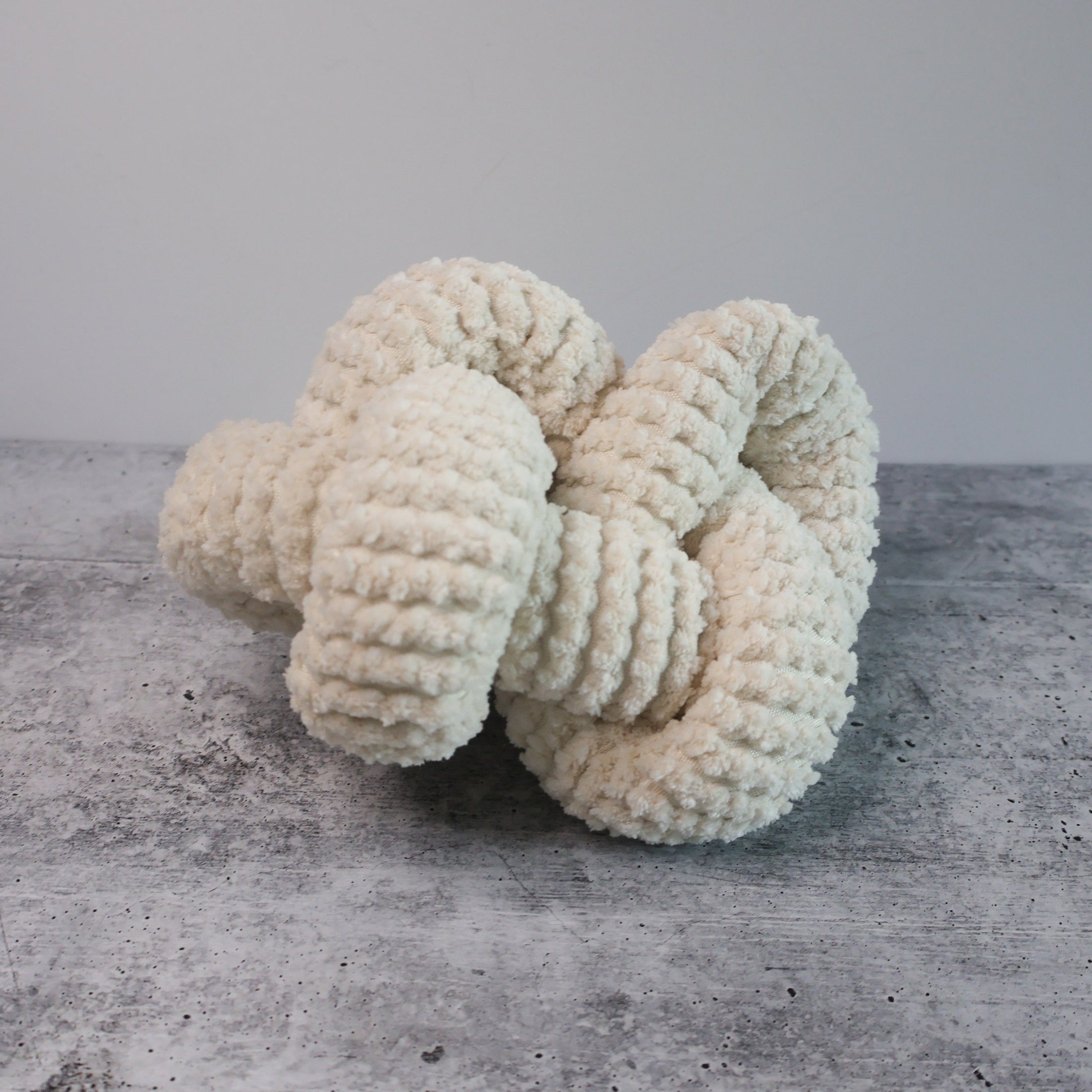 Cream Enrichment Knot Toy